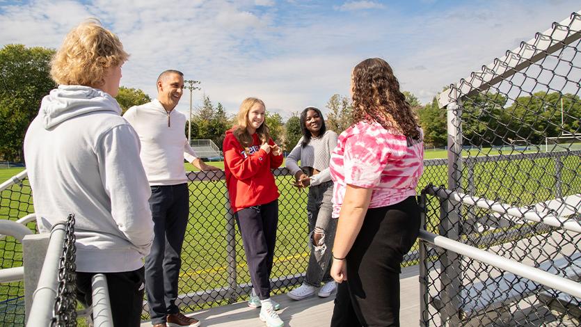 Image of John Liporace visiting with the students at Hoosick Falls High School. 